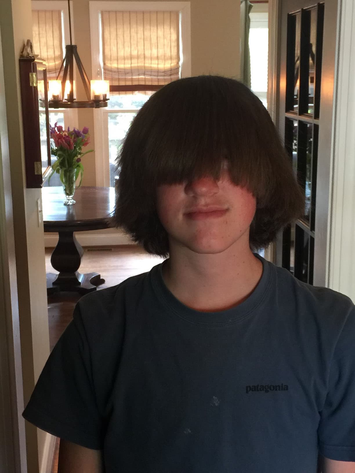 Ryan with hair over his face