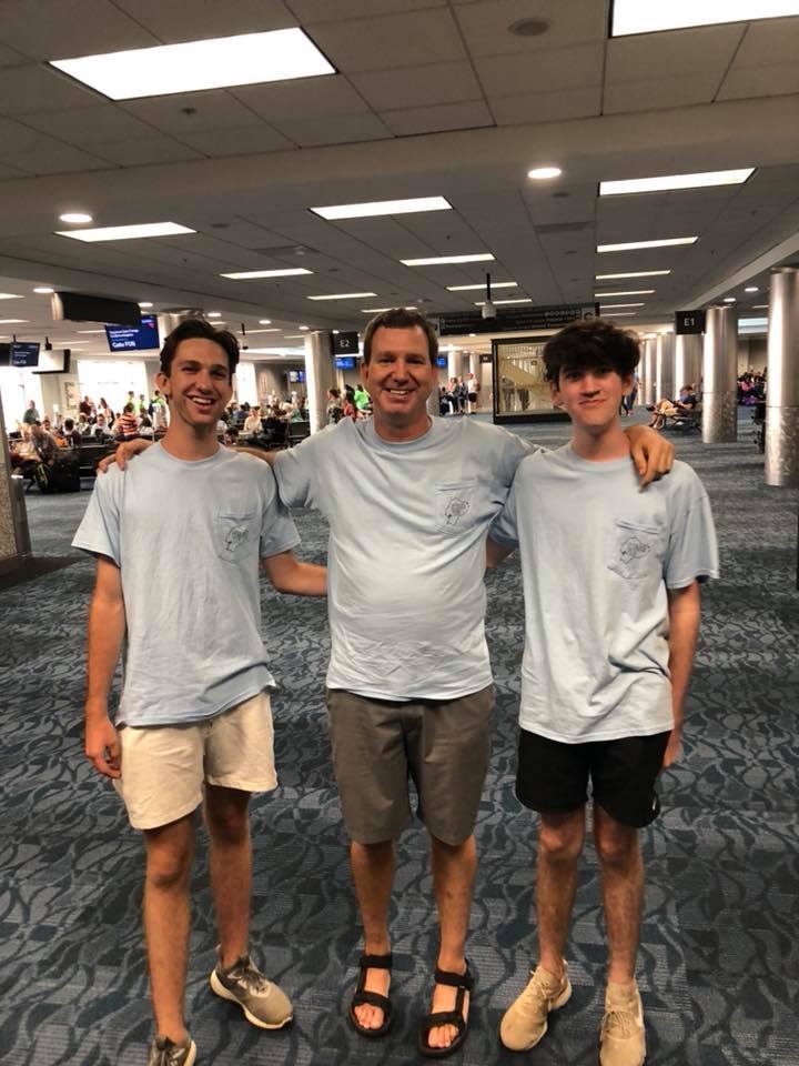 Ryan, Shannon, and Brendan at the airport terminal